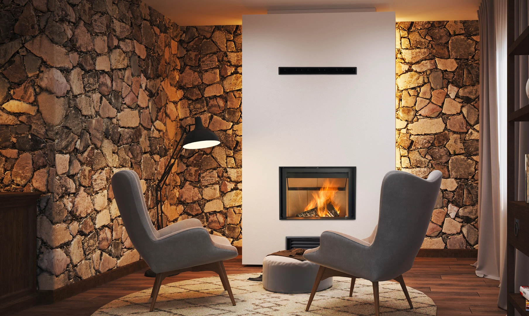 Hogar Serie G Frontal de Rocal negro, con fuego dentro, insertado en pared lisa blanca en salón rústico con paredes de piedra 